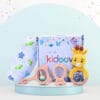 Hello World Baby Gift Set 3 side view with giraffe crochet rattle, fish and bear wooden teethers, and swaddle